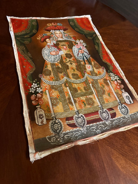 Close-up of Virgen de Belén Peruvian sacred art